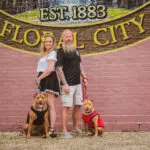 Amy and Matt of the Peddlers Post posing in The heart of downtown Historic Floral City, FL.