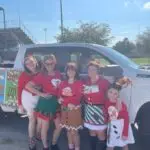 Peddler's Post team and float in Inverness, FL 2021 Christmas Parade and our brand release.