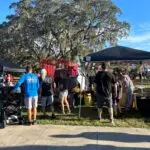 People walking around at the 4th Annual Monster Car Show with the Boys and Girls Club of Hernando County.2023